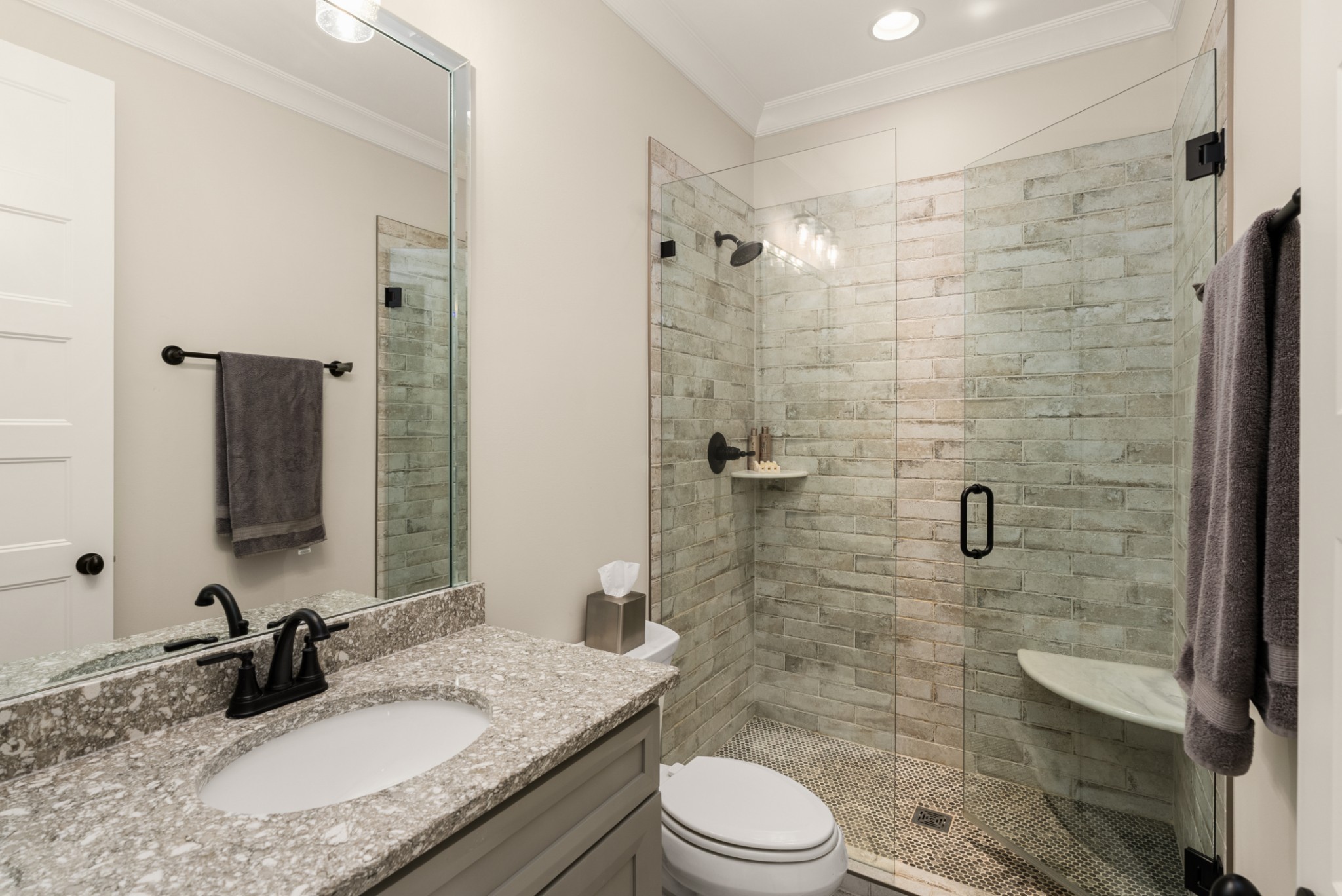 1497 Phillips Road Lebanon, TN 37087 - Photo 30 of 53 a bathroom with a granite countertop sink toilet a mirror and shower
