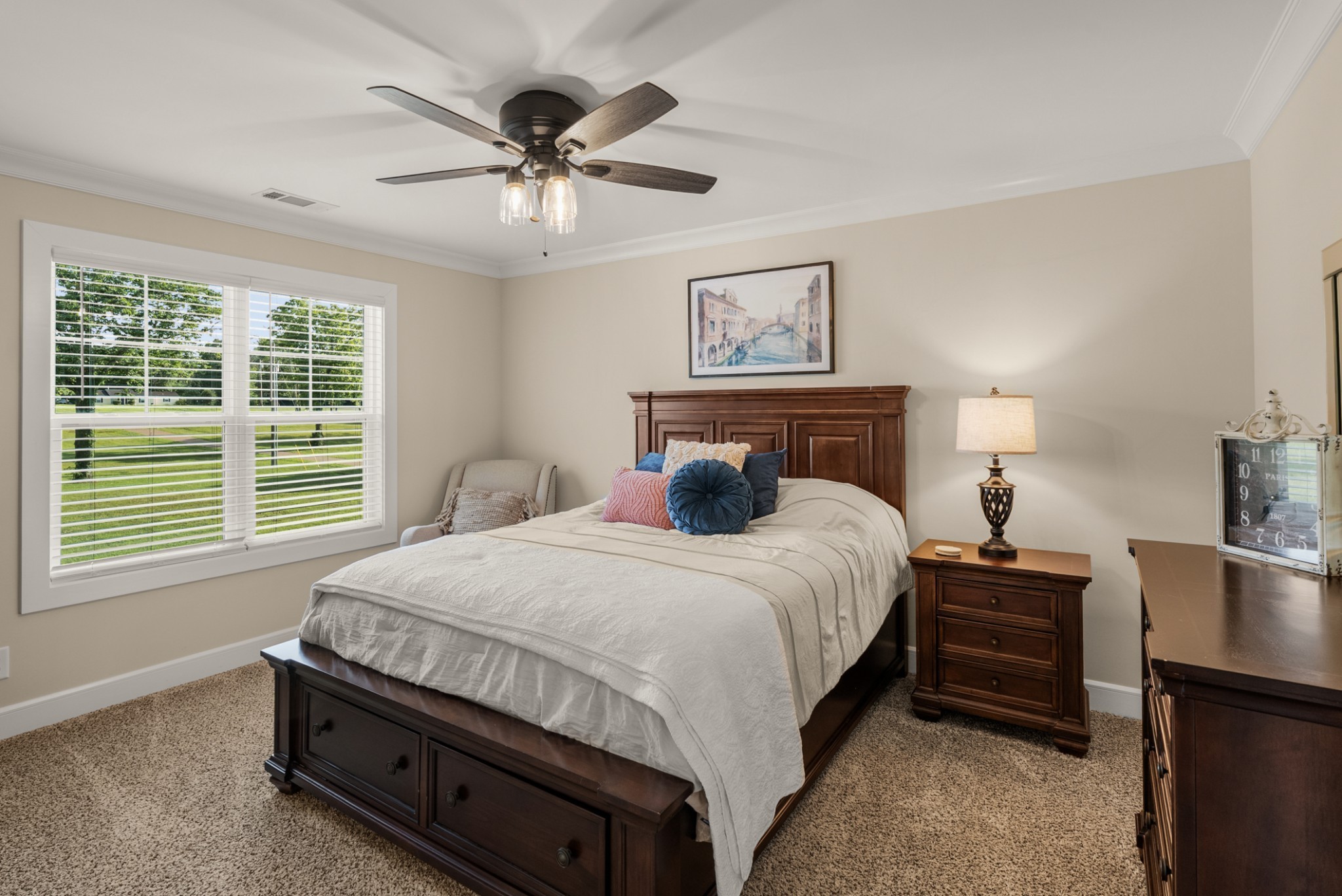 1497 Phillips Road Lebanon, TN 37087 - Photo 32 of 53 a bedroom with a bed a chandelier and a window