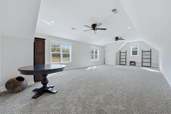 a view of a living room and dining room