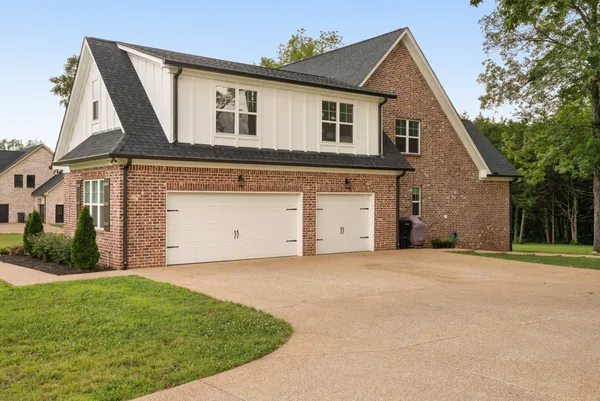 a house view with a garden space