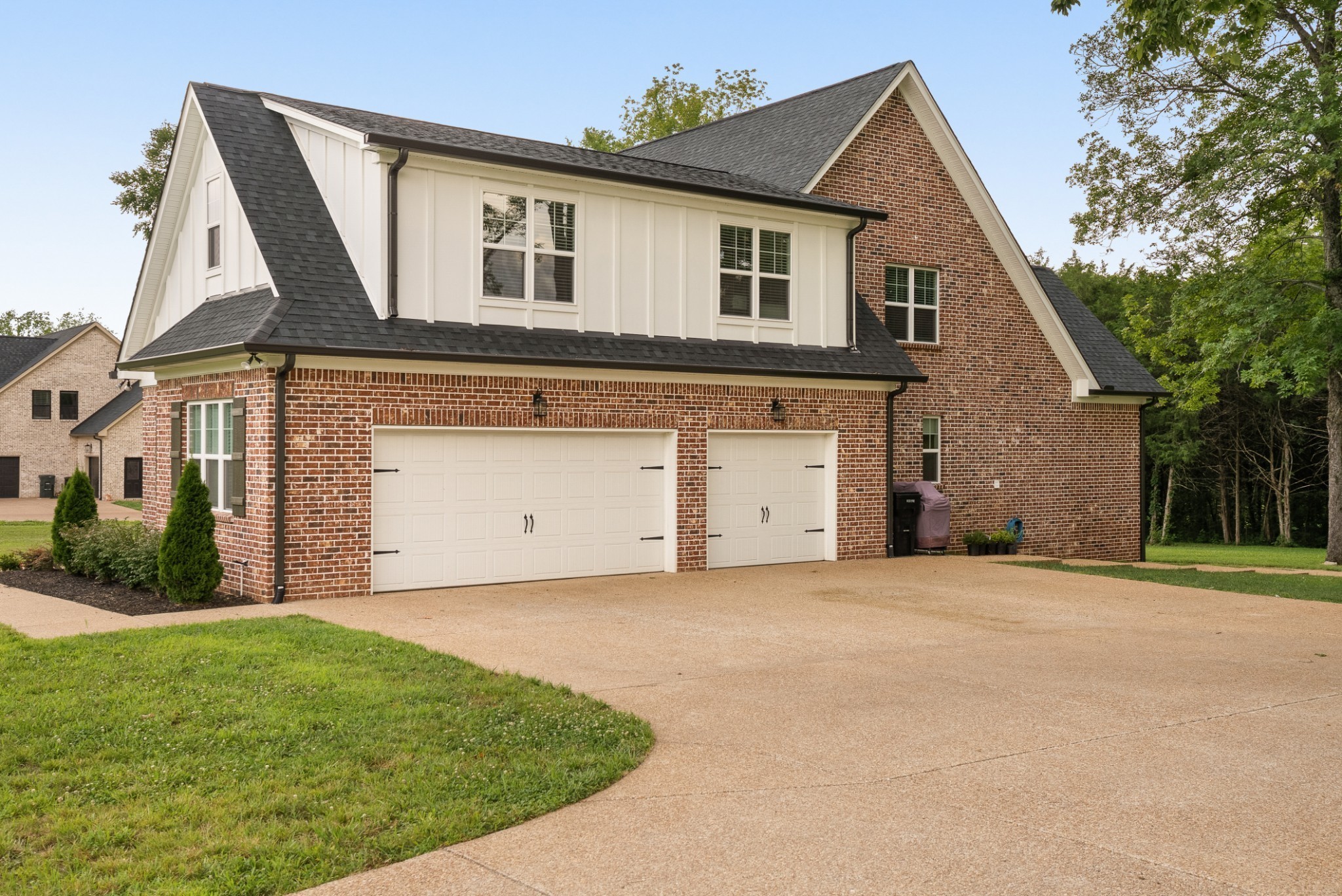 1497 Phillips Road Lebanon, TN 37087 - Photo 41 of 53 a front view of a house with a yard and garage