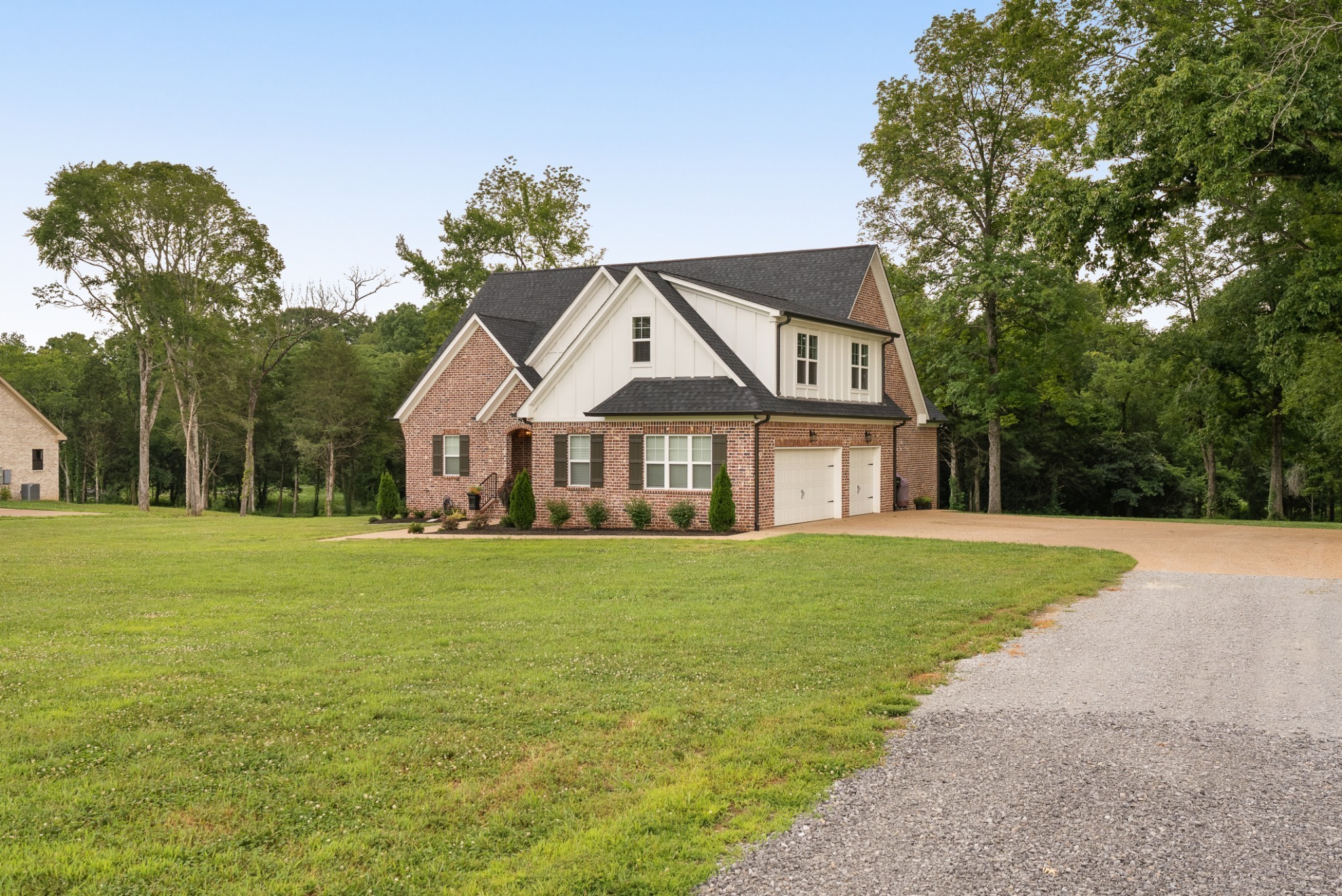1497 Phillips Road Lebanon, TN 37087 - Photo 45 of 53 a front view of a house with a yard and trees