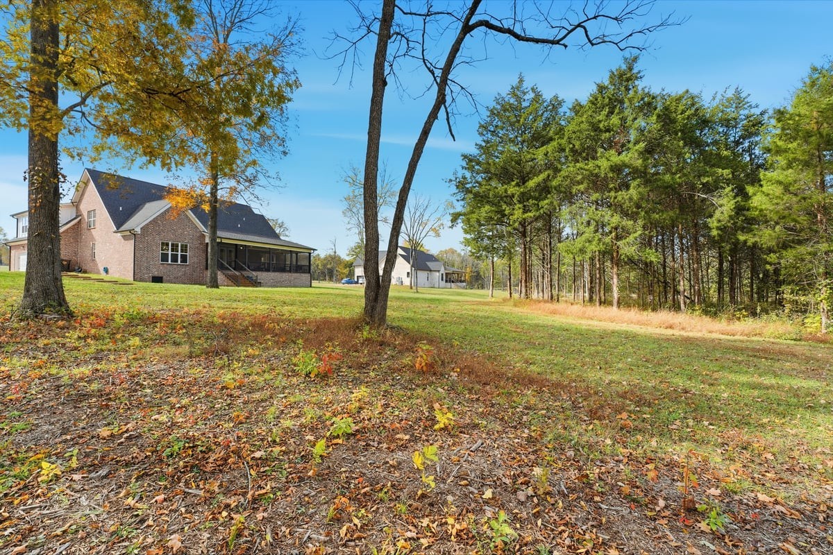1497 Phillips Road Lebanon, TN 37087 - Photo 47 of 53 a view of a tree in front of a house with a big yard