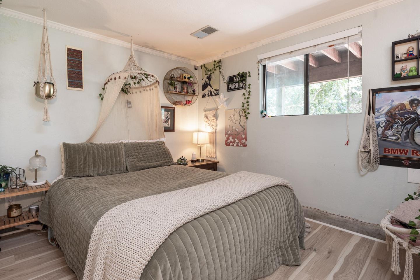 55 Paso Cresta Carmel Valley, CA 93924 - Photo 19 of 31 a bedroom with a bed and a window