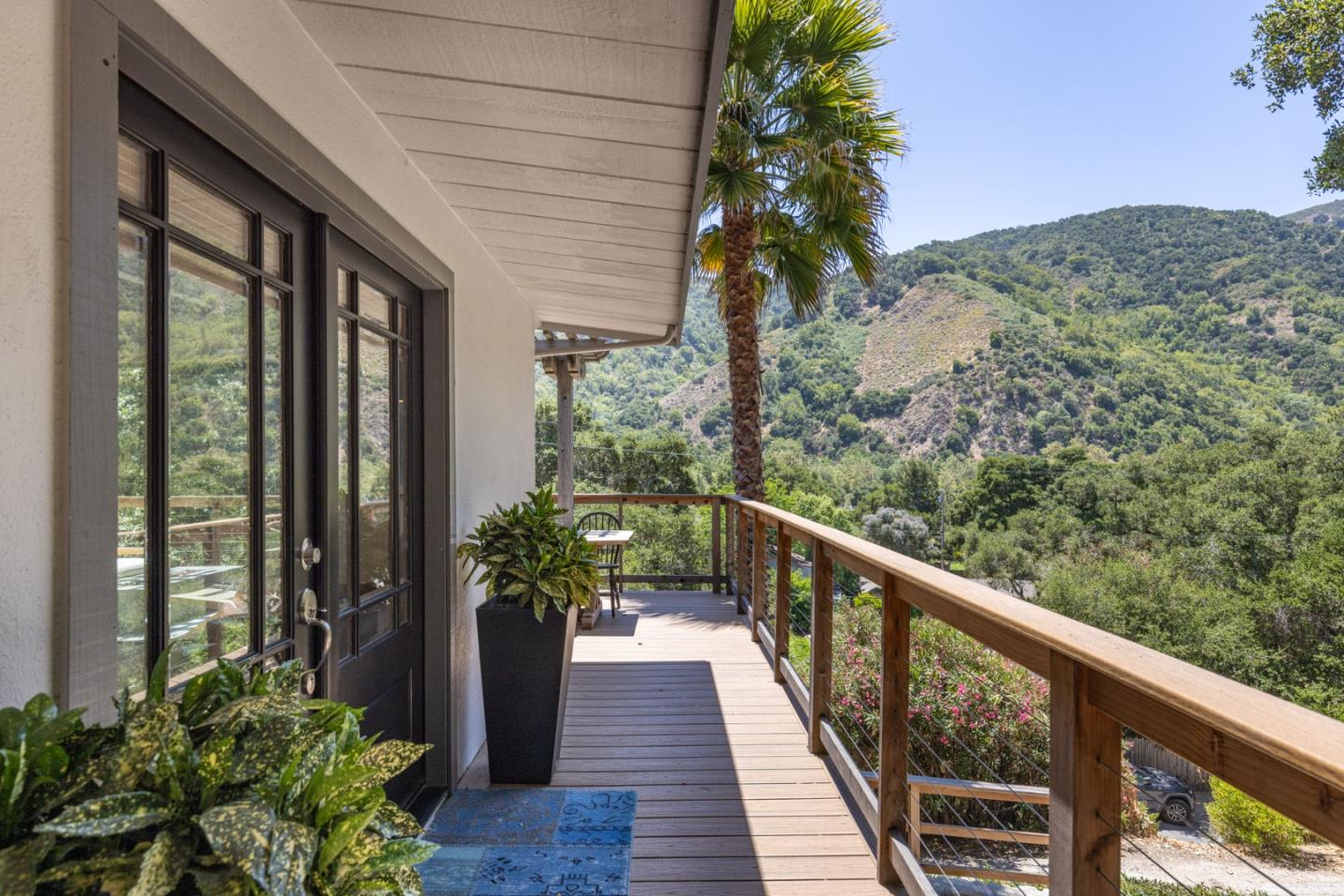 55 Paso Cresta Carmel Valley, CA 93924 - Photo 4 of 31 a view of a balcony with wooden floor