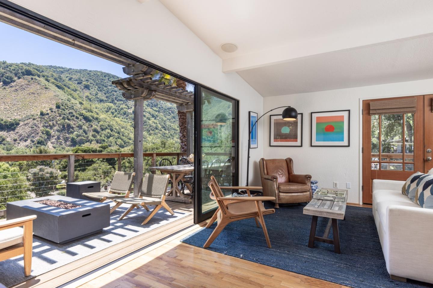55 Paso Cresta Carmel Valley, CA 93924 - Photo 9 of 31 a living room with furniture large window and wooden floor