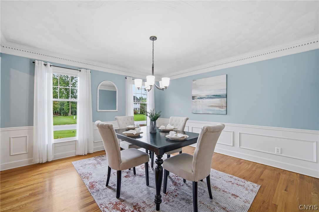 4084 Cortina Road Lysander, NY 13027 - Photo 21 of 48 Perfect hardwoods in the diningroom.