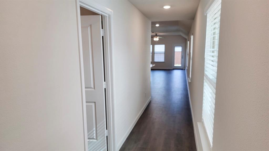 1807 Teton River Drive Blue Ridge, TX 75424 - Photo 7 of 12 a view of a hallway with wooden floor