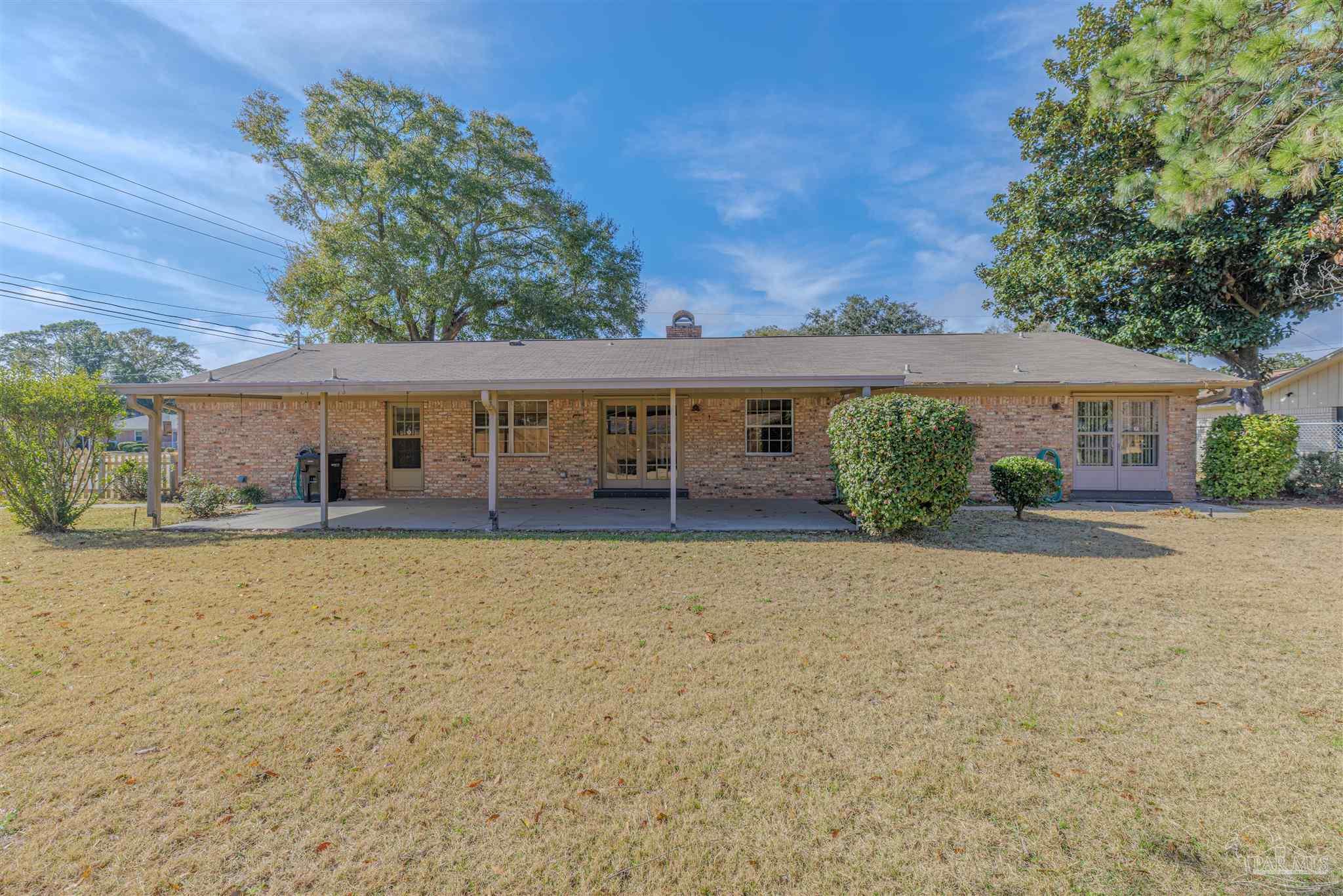 5700 Adelyn Road Pensacola, FL 32504 - Photo 32 of 33 front view of a house with a yard