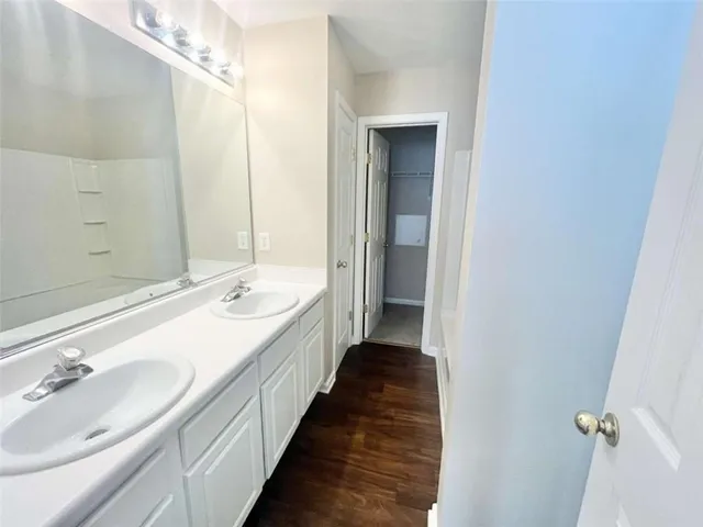 a bathroom with a white bath tub