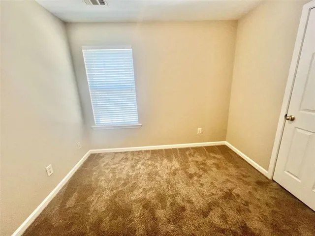 an empty room with a door