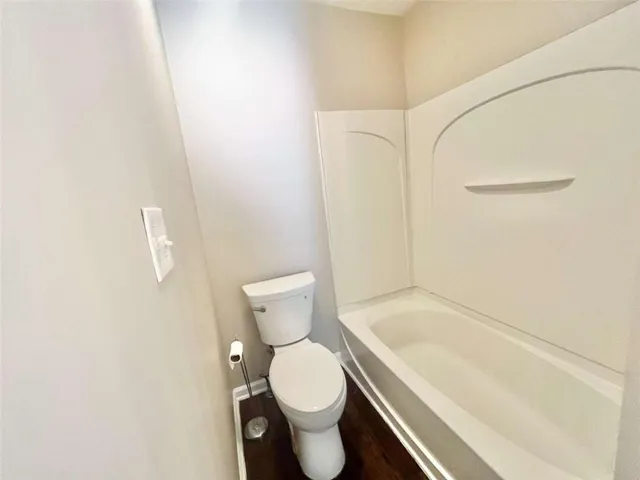 an empty room with a empty space and a window