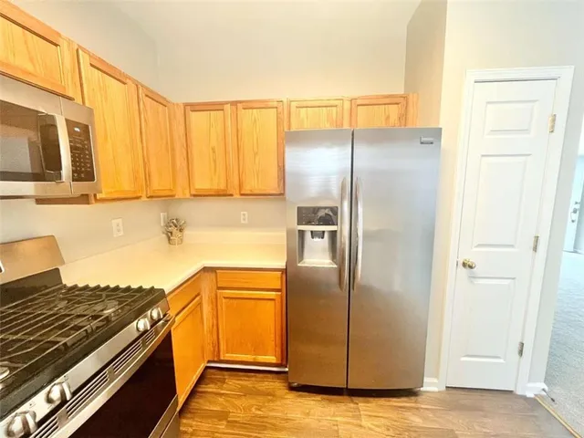 a view of a hallway with stairs