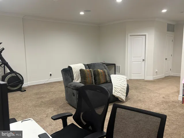 a view of livingroom with furniture