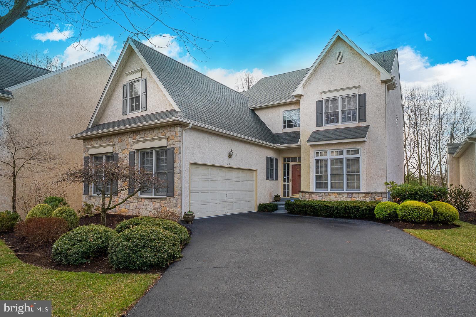 28 Ridgeview Road Newtown Square, PA 19073 - Photo 1 of 49 a front view of a house with garden