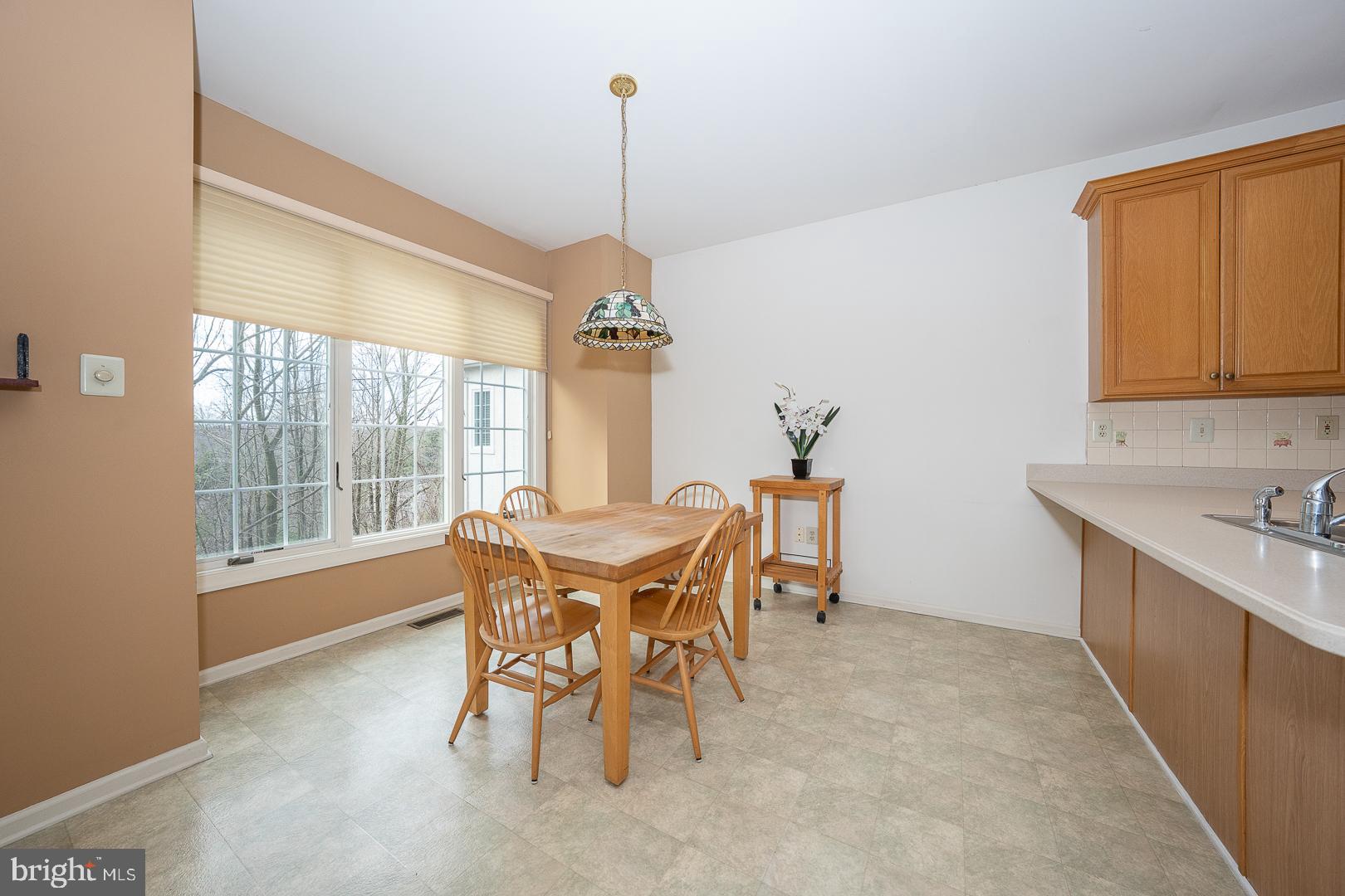 28 Ridgeview Road Newtown Square, PA 19073 - Photo 21 of 49 a view of a dining room with furniture window and outside view