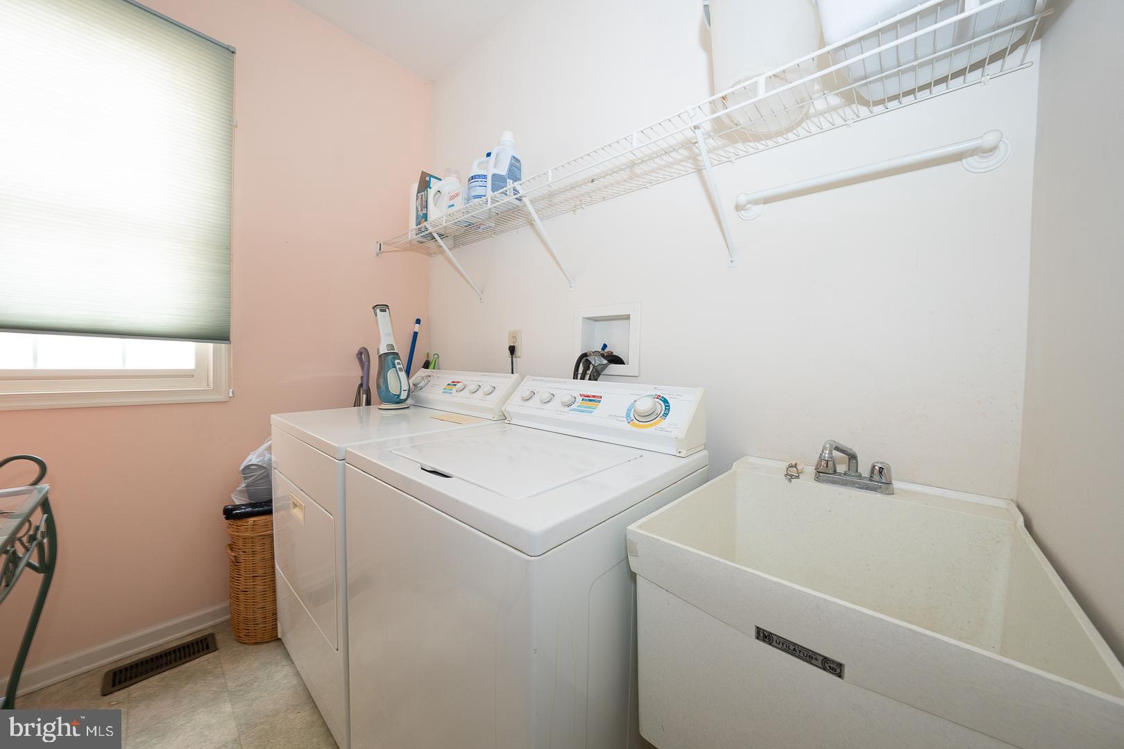 28 Ridgeview Road Newtown Square, PA 19073 - Photo 24 of 49 a utility room with dryer and washer
