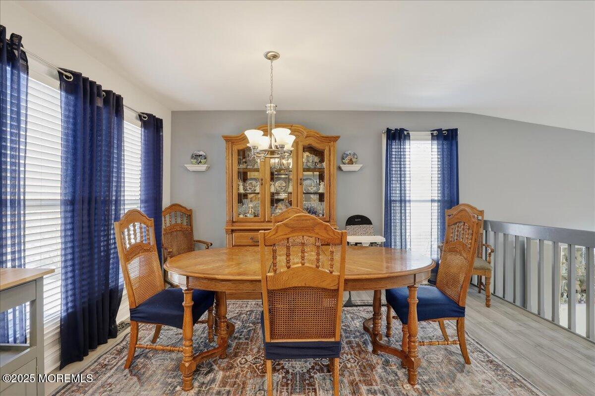 53 Sweet Gum Road Howell, NJ 07731 - Photo 21 of 62 a view of a dining room with furniture window and wooden floor