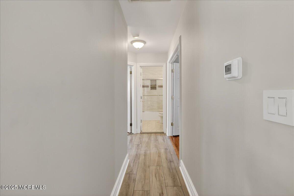53 Sweet Gum Road Howell, NJ 07731 - Photo 23 of 62 a view of a room with wooden floor