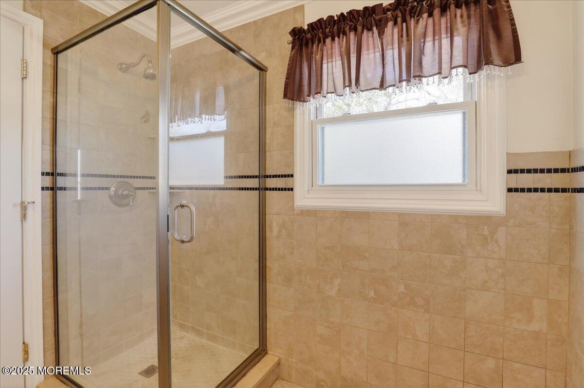53 Sweet Gum Road Howell, NJ 07731 - Photo 28 of 62 a bathroom with a shower