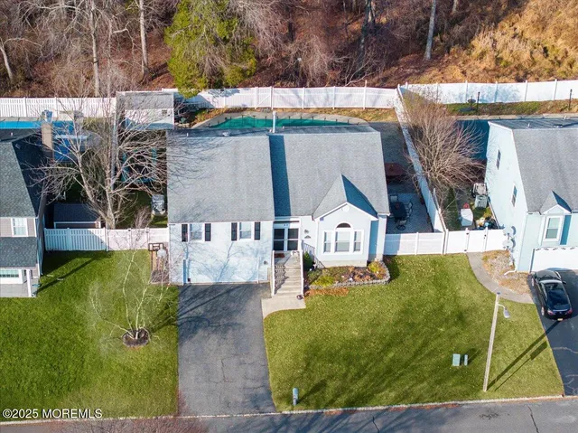 an aerial view of a house with garden