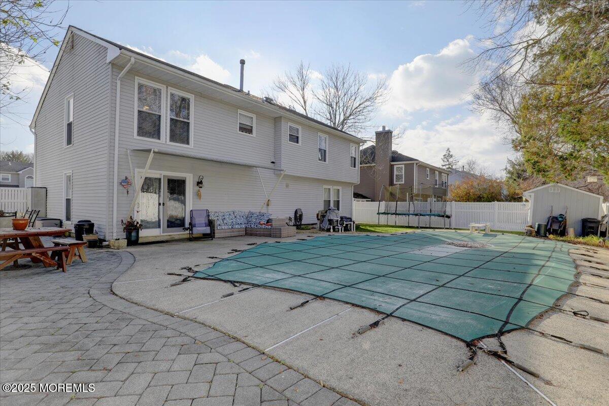 53 Sweet Gum Road Howell, NJ 07731 - Photo 39 of 62 a view of a backyard with sitting area