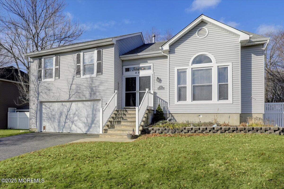 53 Sweet Gum Road Howell, NJ 07731 - Photo 58 of 62 a view of a house with a yard