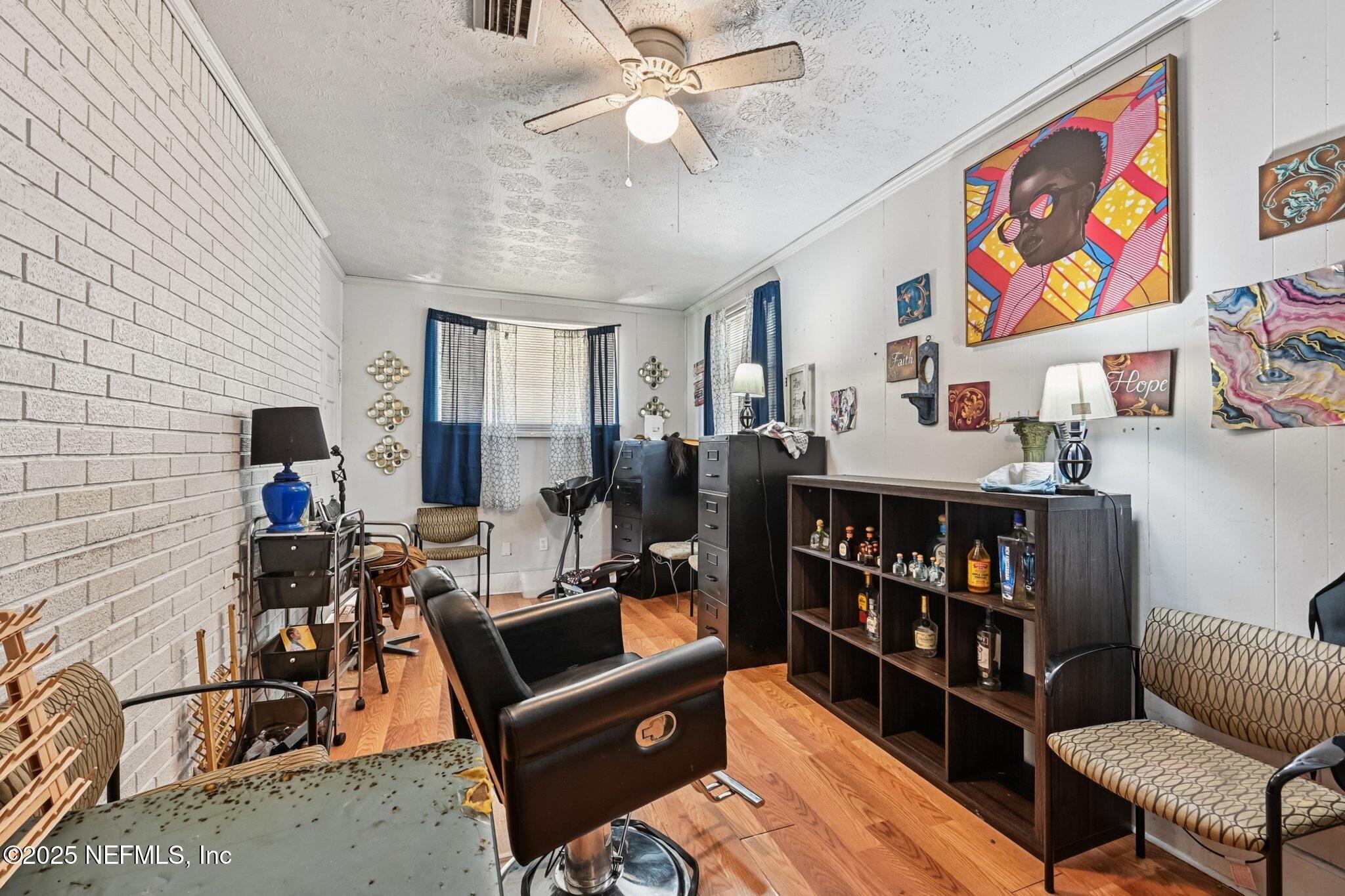5635 Atlee Avenue Jacksonville, FL 32205 - Photo 13 of 31 a room with furniture workspace and a potted plant