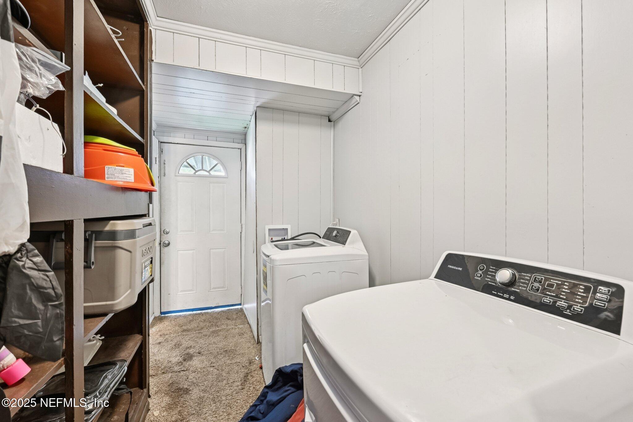 5635 Atlee Avenue Jacksonville, FL 32205 - Photo 24 of 31 a utility room with dryer and washer