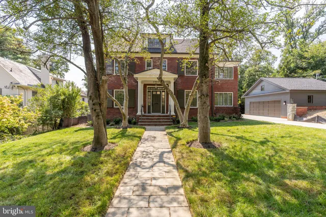 a house with garden in front of it