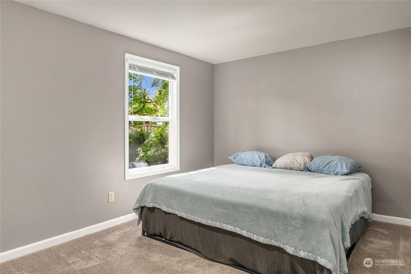 23530 22nd Avenue Southeast Bothell, WA 98021 - Photo 18 of 30 a bedroom with a bed and window
