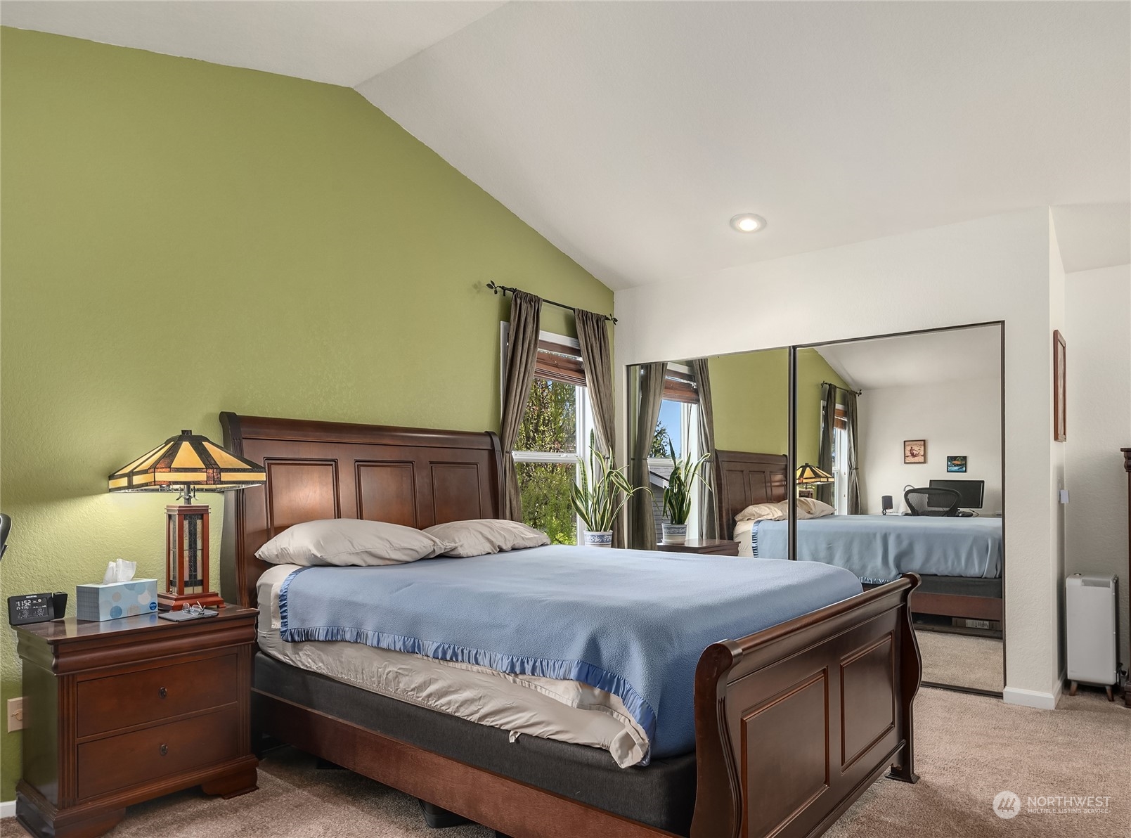 23530 22nd Avenue Southeast Bothell, WA 98021 - Photo 22 of 30 a bedroom with a bed and large mirror
