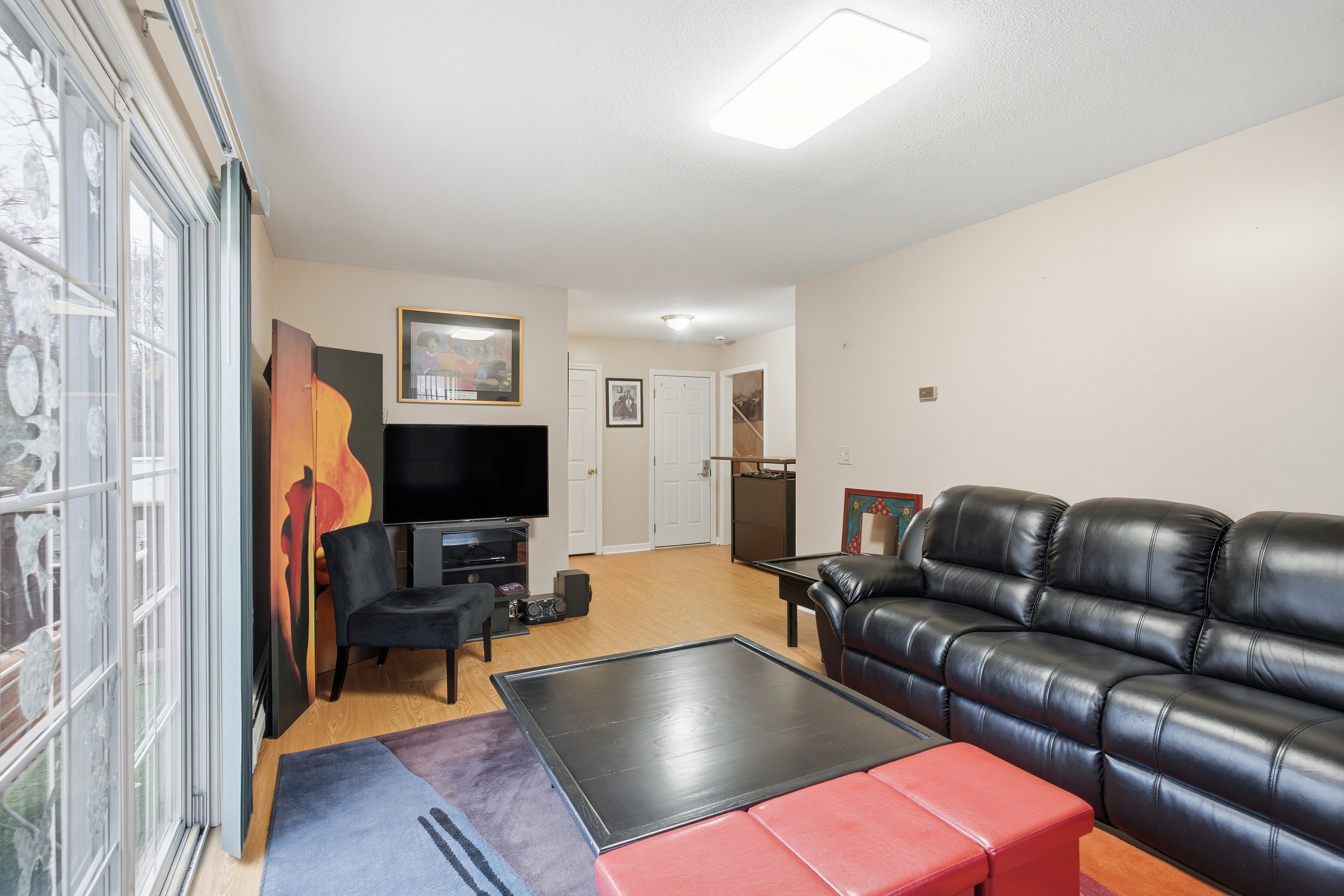 35 Fairfield Lane Bloomfield, CT 06002 - Photo 11 of 40 a living room with furniture and a flat screen tv