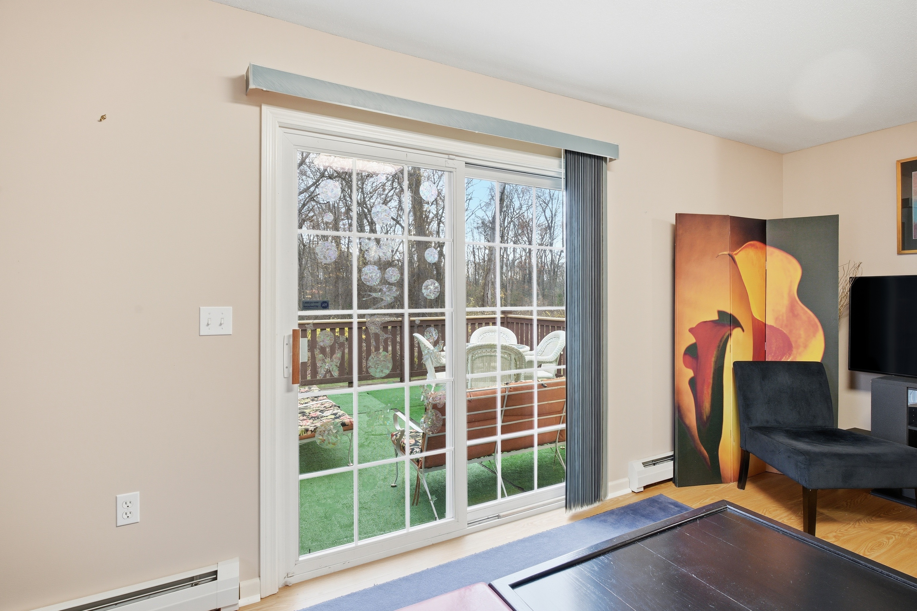 35 Fairfield Lane Bloomfield, CT 06002 - Photo 13 of 40 a view of a living room with a flat screen tv and a window
