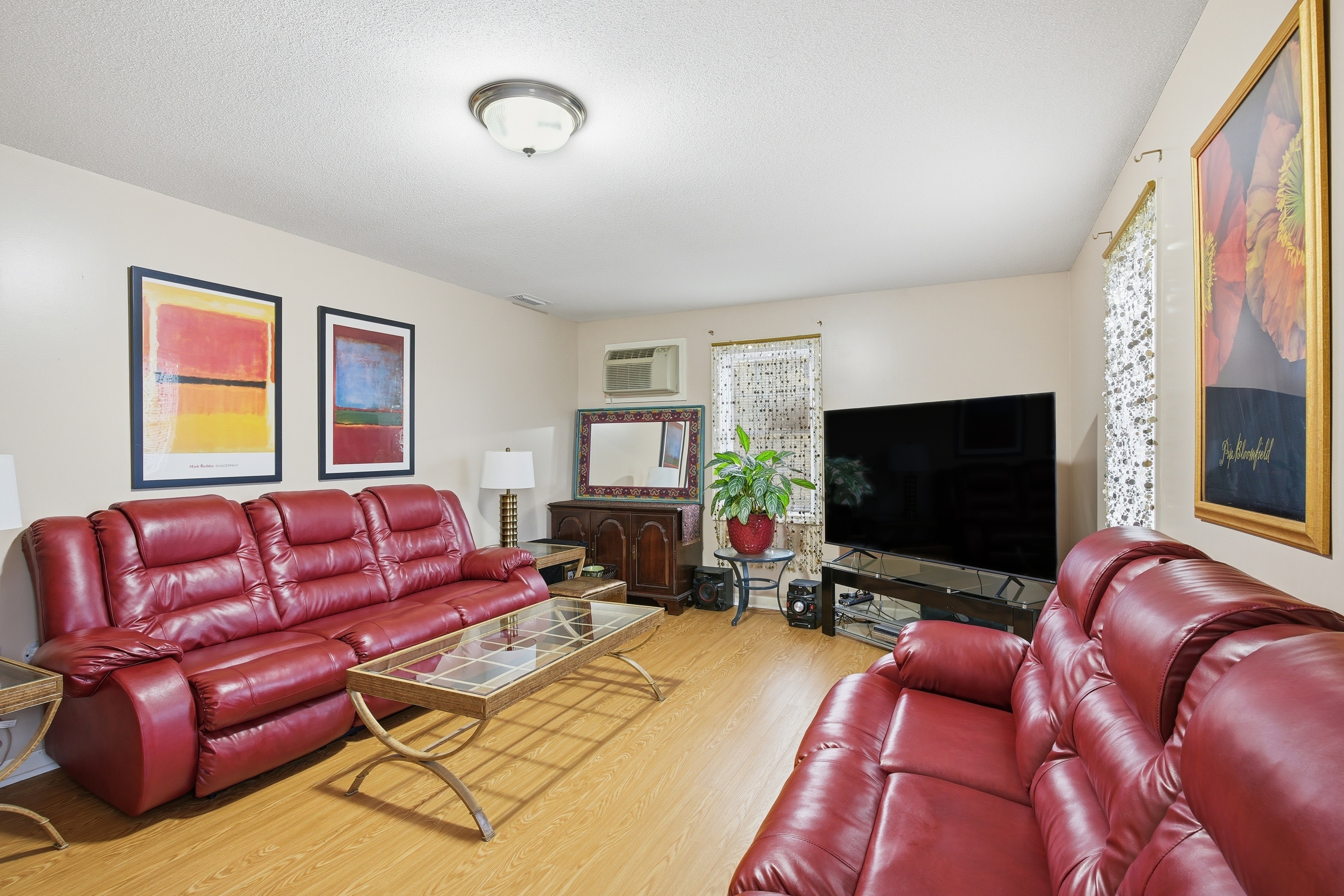 35 Fairfield Lane Bloomfield, CT 06002 - Photo 16 of 40 a living room with furniture and a flat screen tv