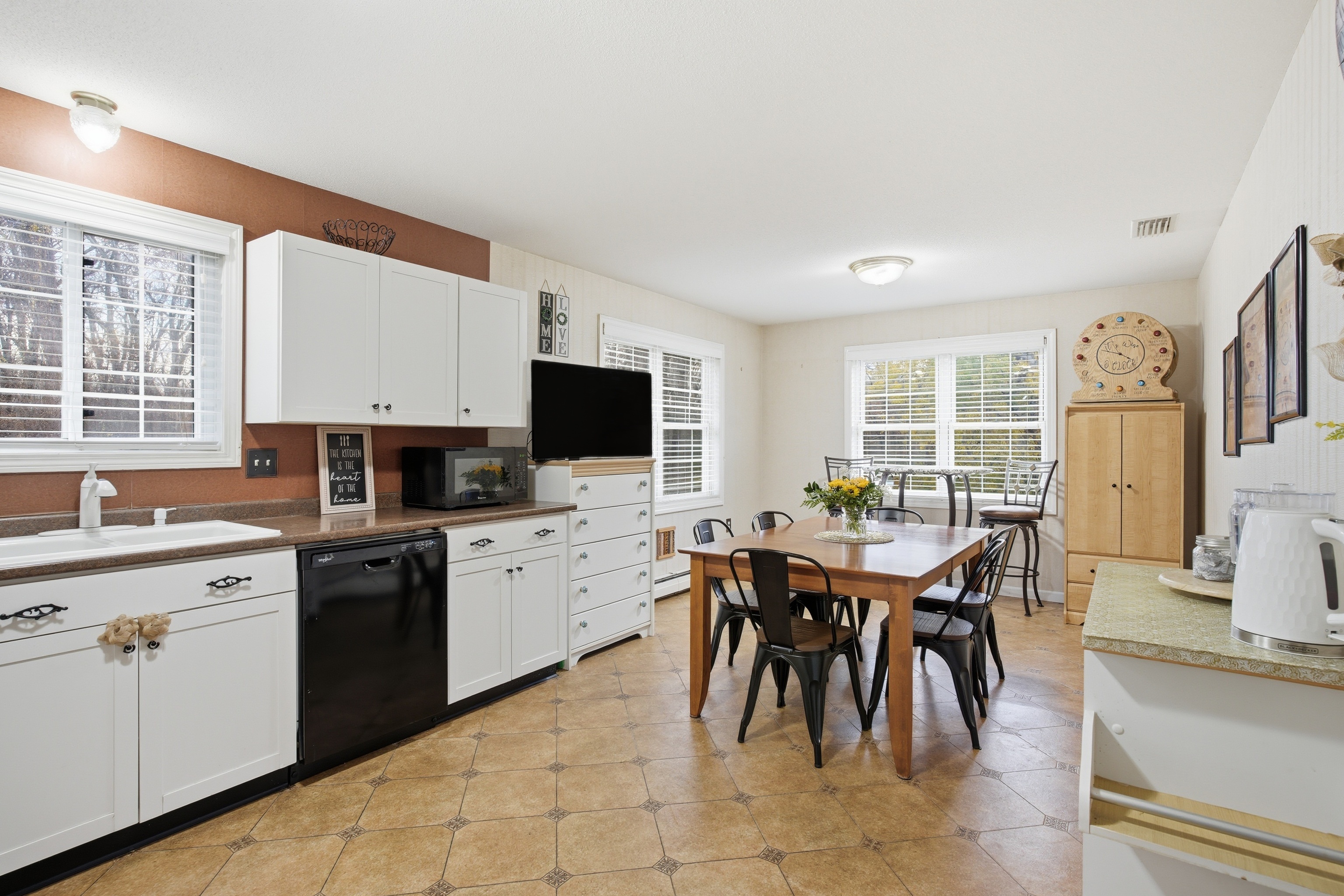 35 Fairfield Lane Bloomfield, CT 06002 - Photo 20 of 40 a view of a dining table and chairs in a room