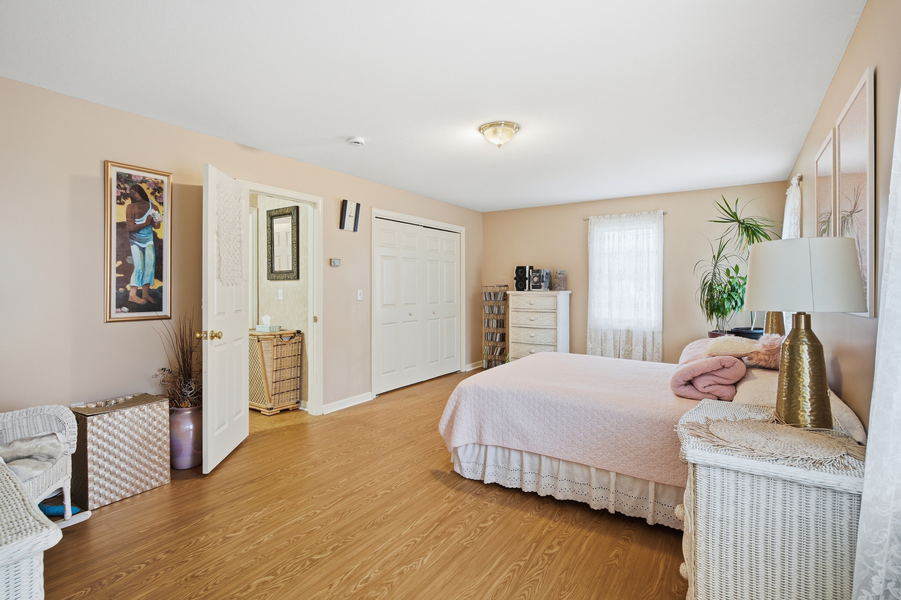 35 Fairfield Lane Bloomfield, CT 06002 - Photo 34 of 40 a bedroom with a bed and wooden floor