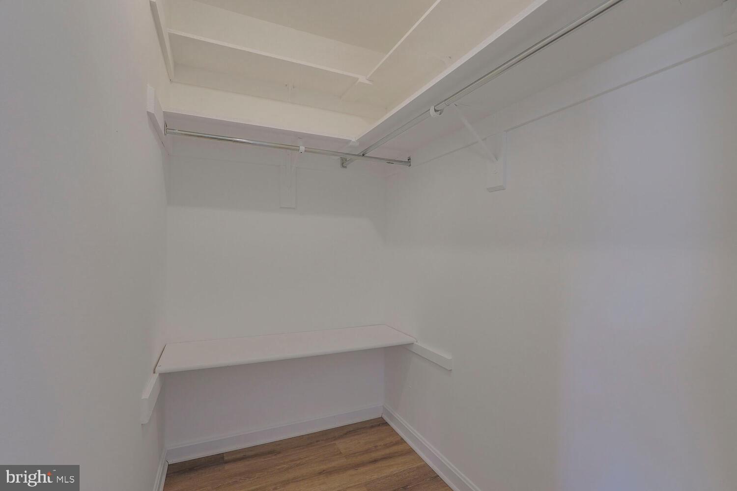 7314 Eggar Woods Lane Springfield, VA 22153 - Photo 13 of 23 a view of an empty walk in closet