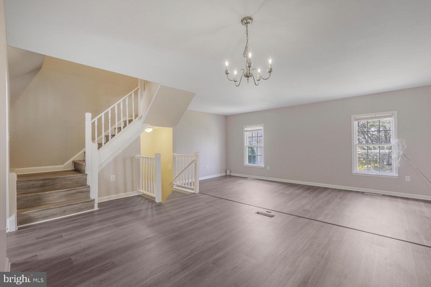 7314 Eggar Woods Lane Springfield, VA 22153 - Photo 7 of 23 a view of an empty room with a window