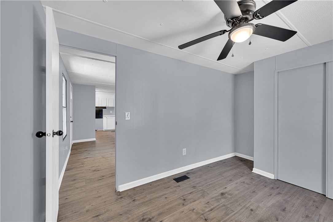 220 Bill Kay Road Belton, SC 29627 - Photo 14 of 30 This bright space features a ceiling fan, durable flooring, and an open layout.