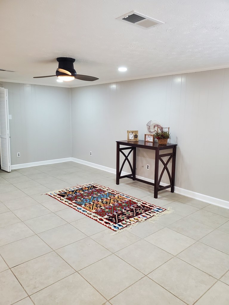 6311 Gable Avenue Columbus, GA 31909 - Photo 2 of 27 a view of a room with gym equipment