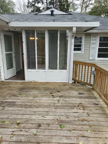 a view of a porch with a yard