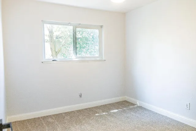 an empty room with a window