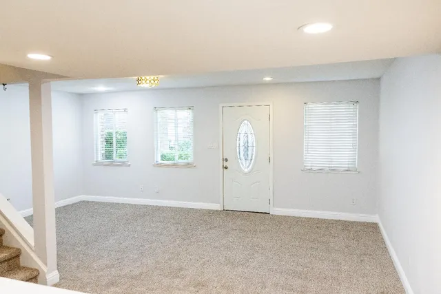 an empty room with windows