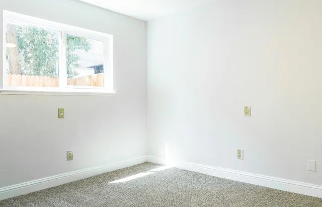 an empty room with a window