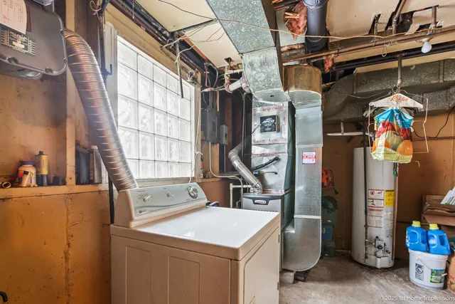 a utility room with dryer and washer