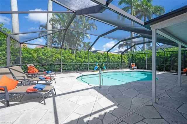 a view of a backyard with sitting area and furniture