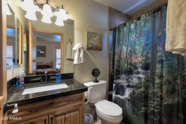 a bed room with bed and window