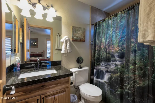 a bed room with bed and window