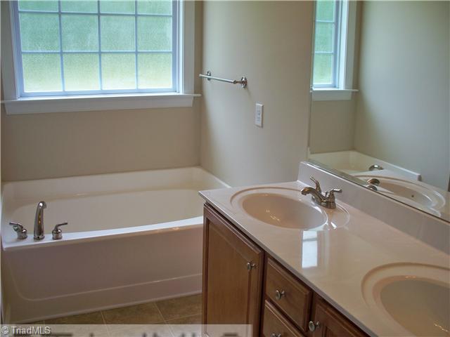 6315 Ridge Haven Road Greensboro, NC 27410 - Photo 12 of 13 Master Bath/Spa. Garden Tub with separate shower.